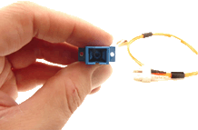 Front View of a hand holding a SC Adapter Panel Connector