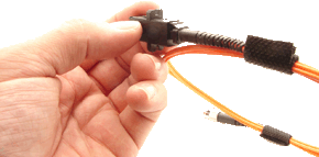 Side view of a hand holding a MTRJ Adapter Panel Connector