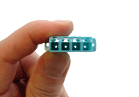 Hand Holding LC Quad Coupler